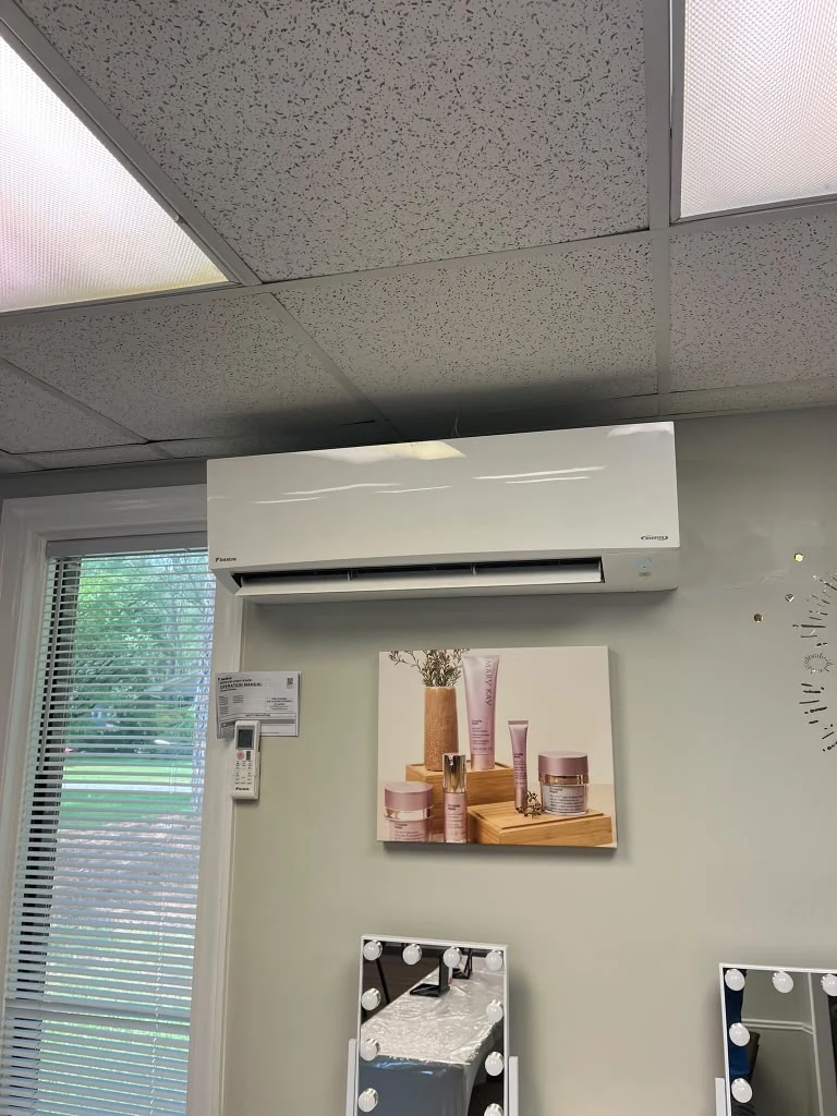 Wall-mounted ductless indoor unit in a finished room